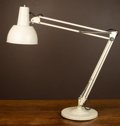 Anglepoise model 82  Anglepoise Model 1208 Adjustable in height and angle scissor desk lamp